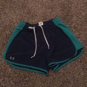 Under armour running or workout shorts